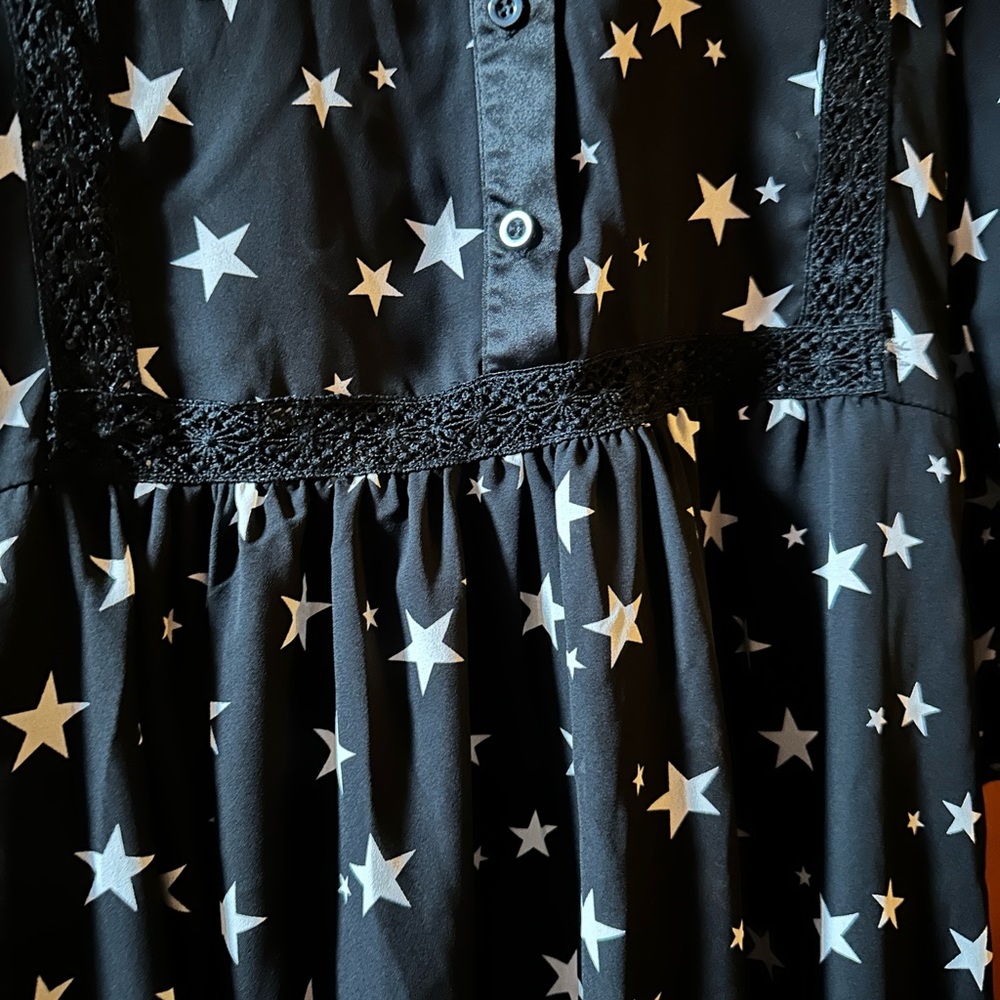 Romeo & Juliet Couture. Size small. Black with white stars